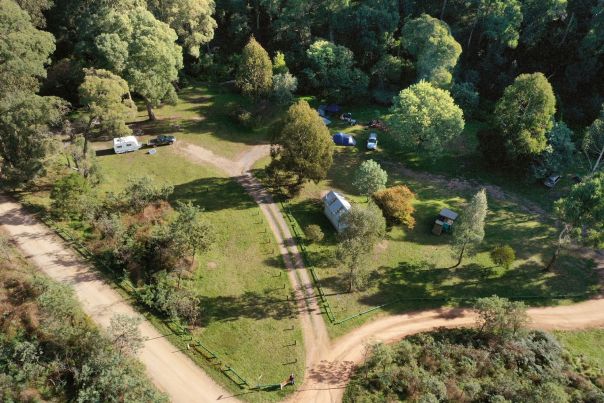 A birds-eye view of the Reserve with the large open grassy campground offering many camping and caravan spots 