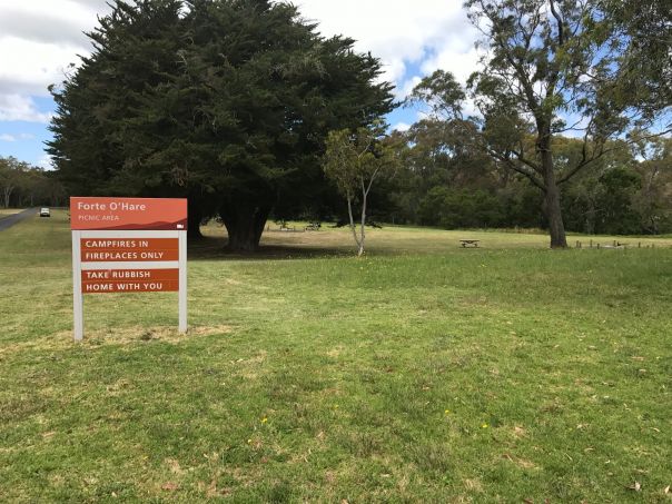 A sign on a large grassy picnic area that reads Forte O'Hare Picnic Area