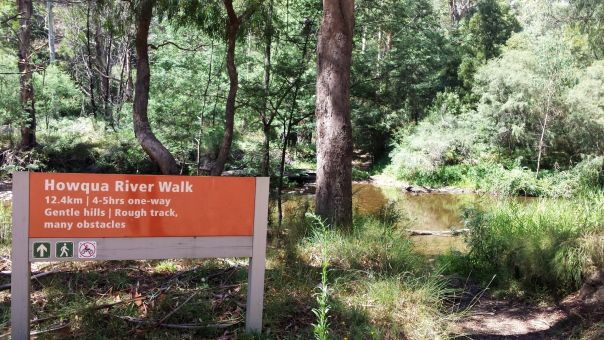 A sign for the Howqua River Walk next to Howqua River